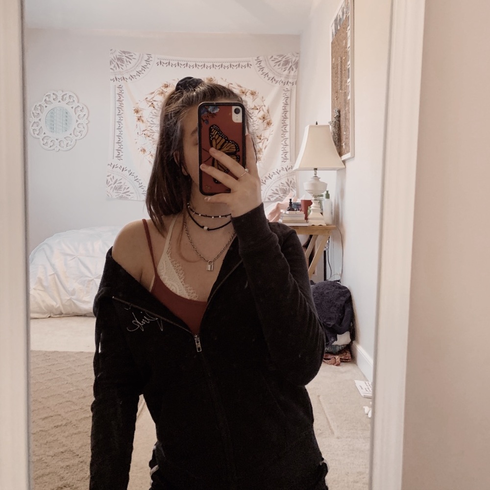 small vs pink black zip up